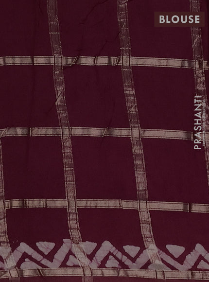 Semi chanderi saree wine shade with allover zari checks & batik prints in borderless style