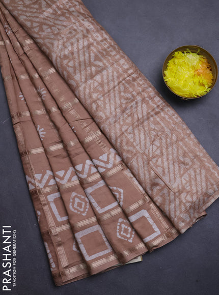 Semi chanderi saree pastel brown with allover zari checks & batik prints in borderless style