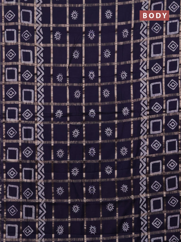 Semi chanderi saree navy blue with allover zari checks & batik prints in borderless style