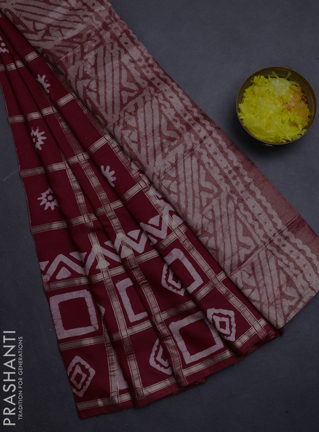 Semi chanderi saree maroon with allover zari checks & batik prints in borderless style