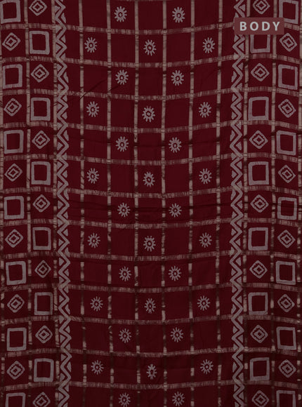 Semi chanderi saree maroon with allover zari checks & batik prints in borderless style