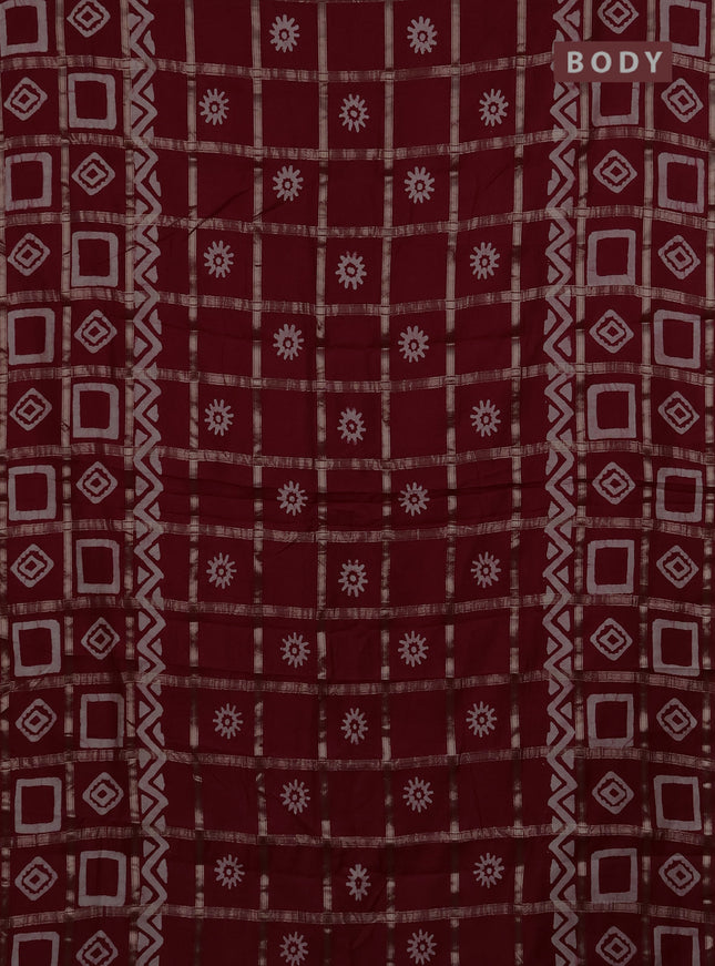 Semi chanderi saree maroon with allover zari checks & batik prints in borderless style