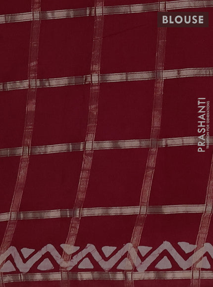 Semi chanderi saree maroon with allover zari checks & batik prints in borderless style