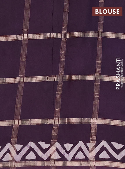 Semi chanderi saree jamun with allover zari checks & batik prints in borderless style
