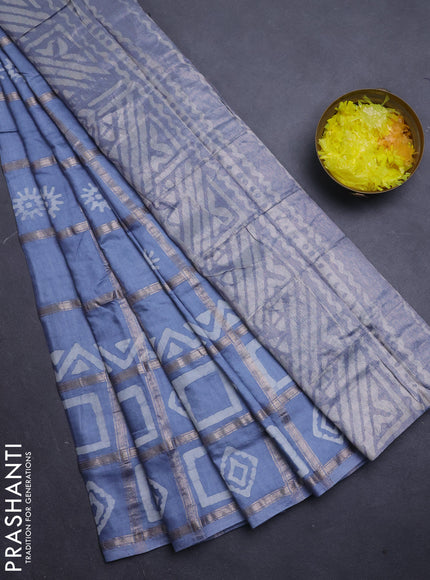 Semi chanderi saree grey shade with allover zari checks & batik prints in borderless style