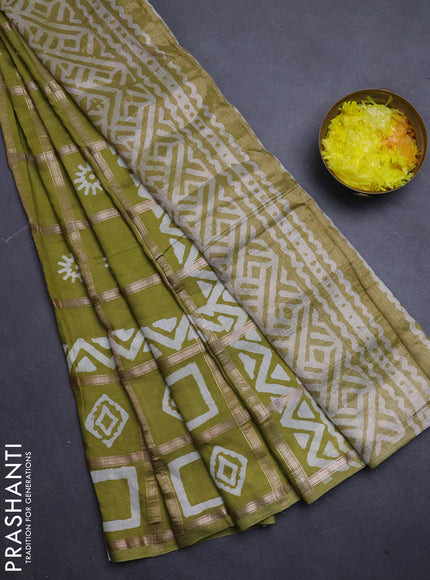 Semi chanderi saree lime green with allover zari checks & batik prints in borderless style