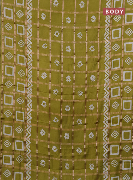Semi chanderi saree lime green with allover zari checks & batik prints in borderless style