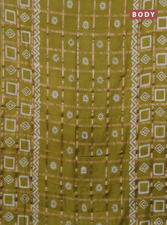 Semi chanderi saree lime green with allover zari checks & batik prints in borderless style