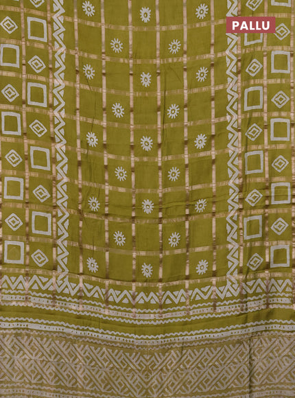 Semi chanderi saree lime green with allover zari checks & batik prints in borderless style