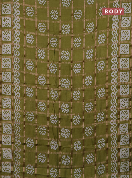 Semi chanderi saree mehendi green with allover zari checks & batik prints in borderless style