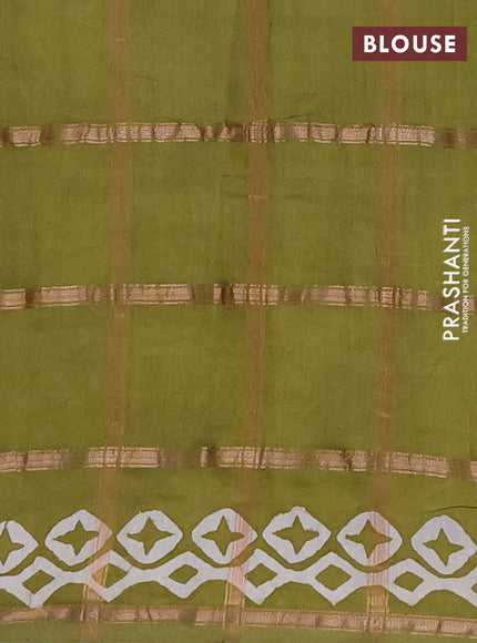 Semi chanderi saree mehendi green with allover zari checks & batik prints in borderless style
