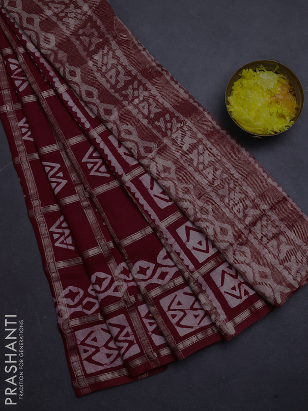 Semi chanderi saree maroon with allover zari checks & batik prints in borderless style