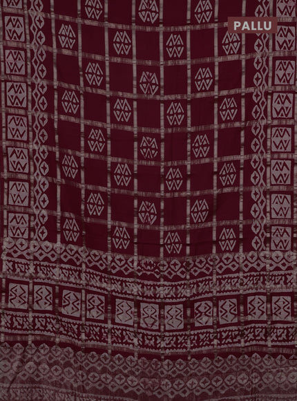 Semi chanderi saree maroon with allover zari checks & batik prints in borderless style