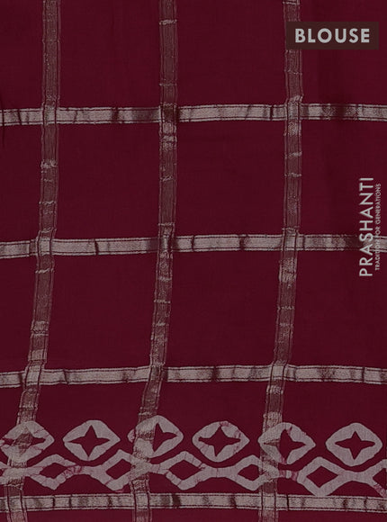 Semi chanderi saree maroon with allover zari checks & batik prints in borderless style
