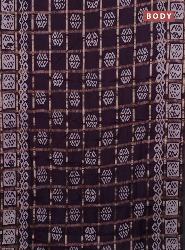 Semi chanderi saree jamun shade with allover zari checks & batik prints in borderless style