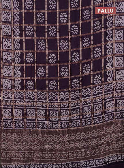 Semi chanderi saree jamun shade with allover zari checks & batik prints in borderless style