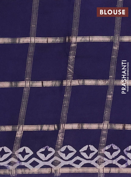 Semi chanderi saree navy blue with allover zari checks & batik prints in borderless style