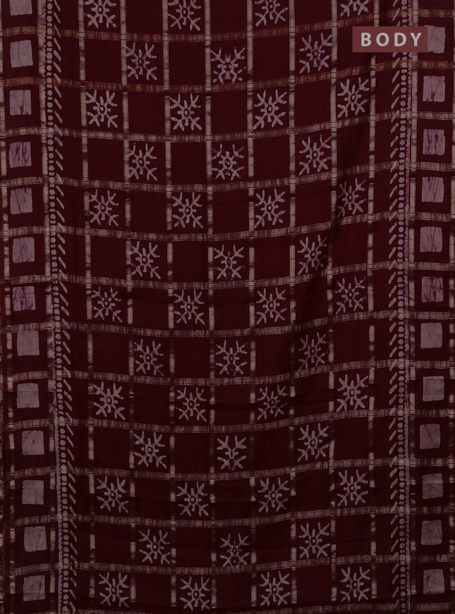 Semi chanderi saree deep maroon with allover zari checks & batik prints in borderless style