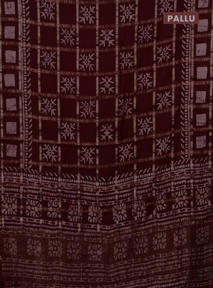 Semi chanderi saree deep maroon with allover zari checks & batik prints in borderless style
