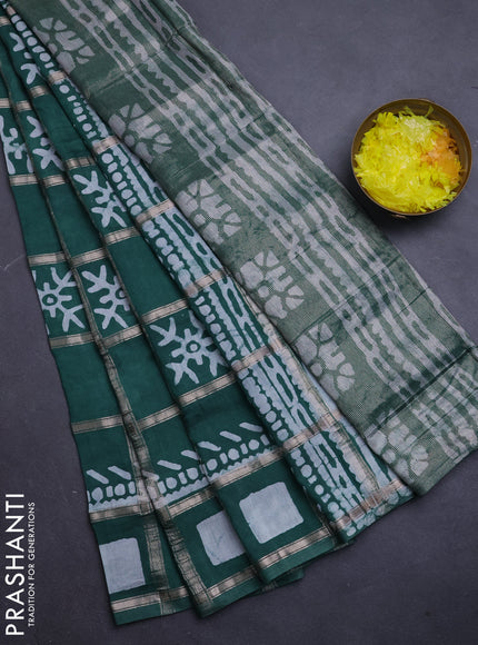 Semi chanderi saree green with allover zari checks & batik prints in borderless style