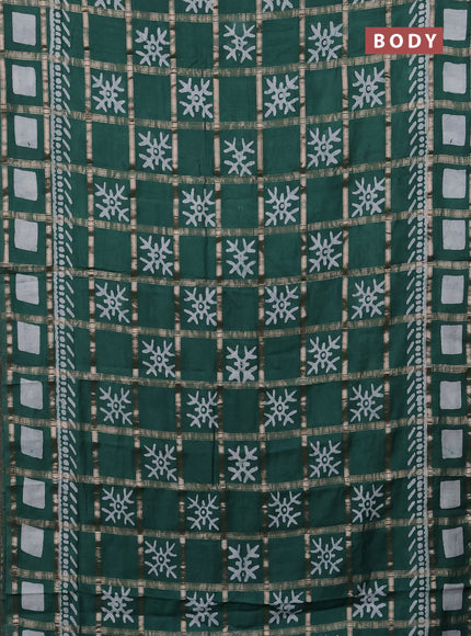 Semi chanderi saree green with allover zari checks & batik prints in borderless style