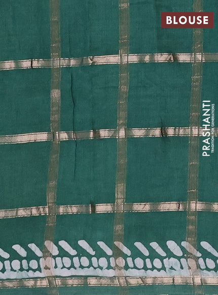 Semi chanderi saree green with allover zari checks & batik prints in borderless style