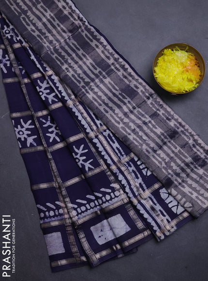 Semi chanderi saree navy blue with allover zari checks & batik prints in borderless style