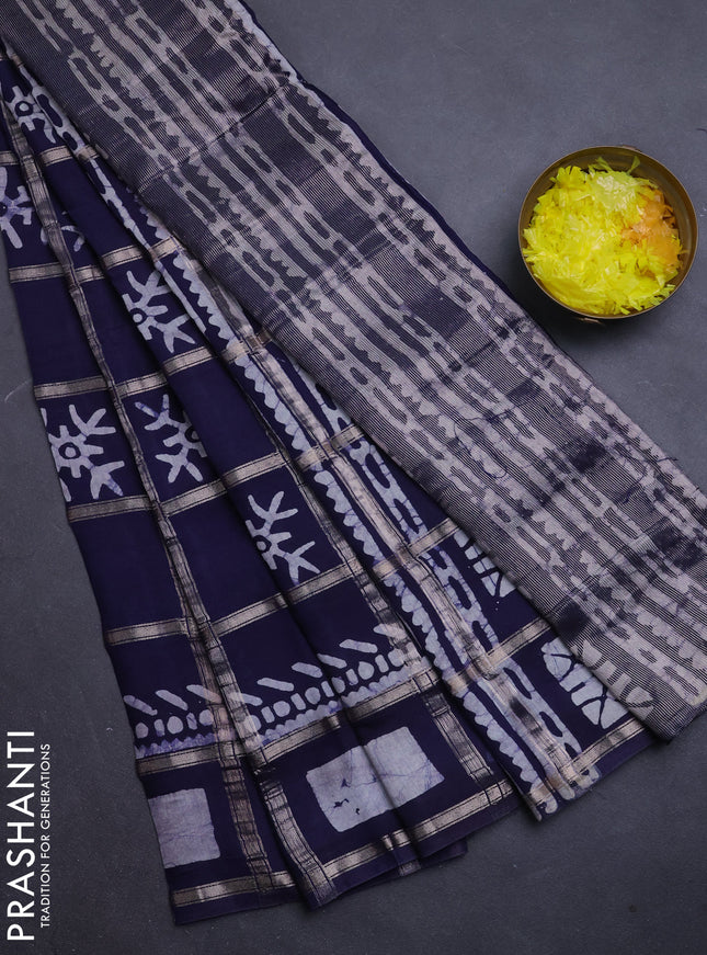 Semi chanderi saree navy blue with allover zari checks & batik prints in borderless style