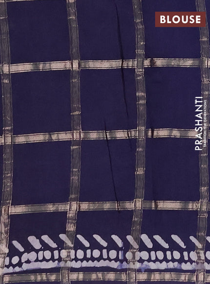 Semi chanderi saree navy blue with allover zari checks & batik prints in borderless style