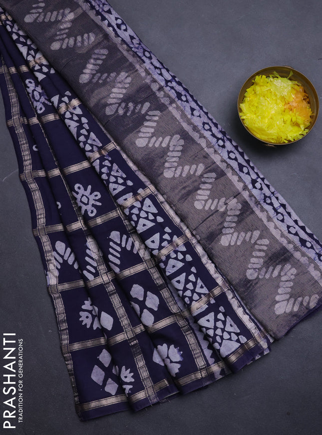 Semi chanderi saree navy blue with allover zari checks & batik prints in borderless style
