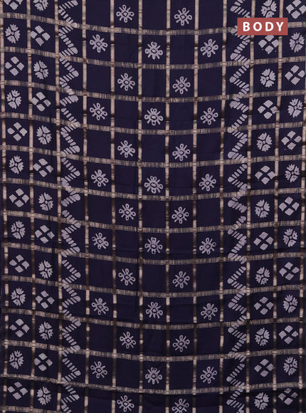 Semi chanderi saree navy blue with allover zari checks & batik prints in borderless style