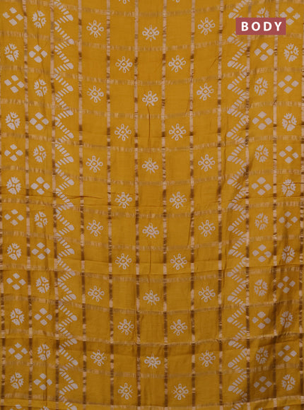 Semi chanderi saree mustard with allover zari checks & batik prints in borderless style