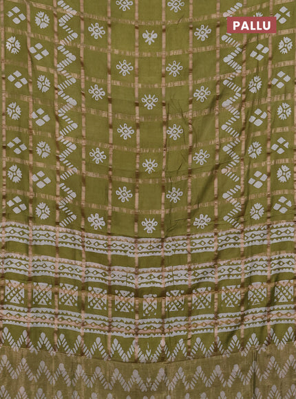 Semi chanderi saree mehendi green with allover zari checks & batik prints in borderless style