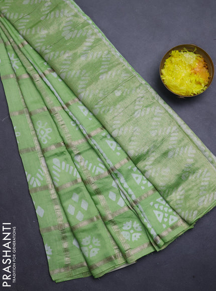 Semi chanderi saree pista green with allover zari checks & batik prints in borderless style