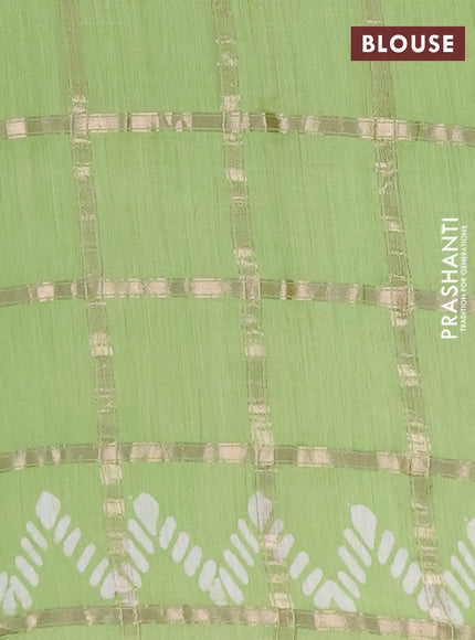 Semi chanderi saree pista green with allover zari checks & batik prints in borderless style