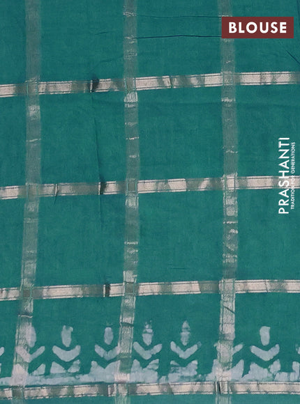 Semi chanderi saree teal green with allover zari checks & batik prints in borderless style