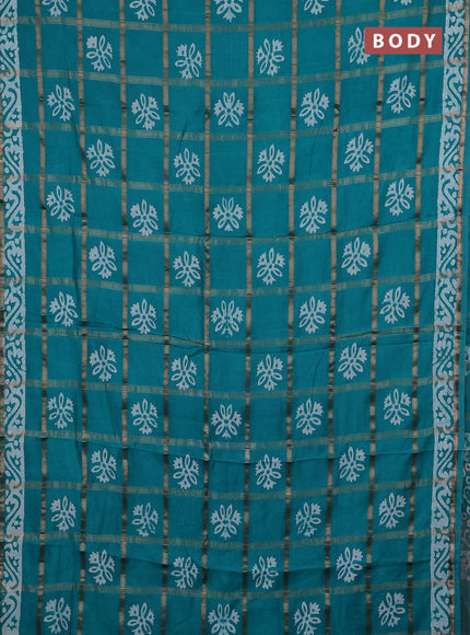 Semi chanderi saree teal green with allover zari checks & batik prints in borderless style
