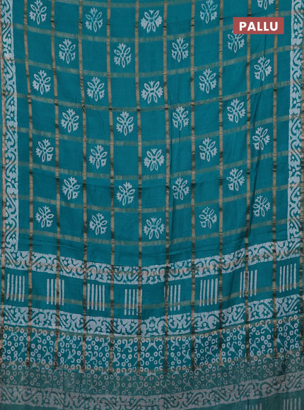 Semi chanderi saree teal green with allover zari checks & batik prints in borderless style