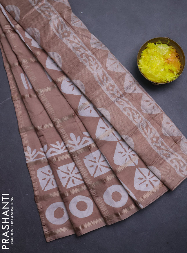 Semi chanderi saree sandal with allover zari checks & batik prints in borderless style