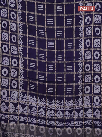 Semi chanderi saree navy blue with allover zari checks & batik prints in borderless style