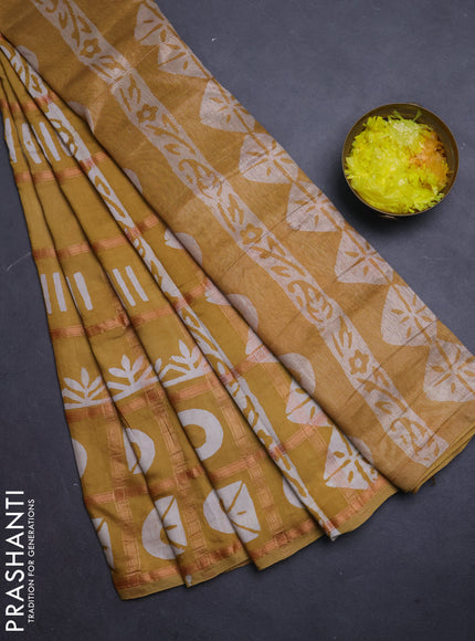 Semi chanderi saree mustard yellow with allover zari checks & batik prints in borderless style