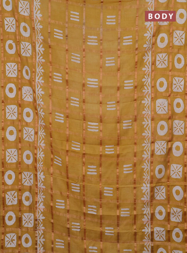 Semi chanderi saree mustard yellow with allover zari checks & batik prints in borderless style