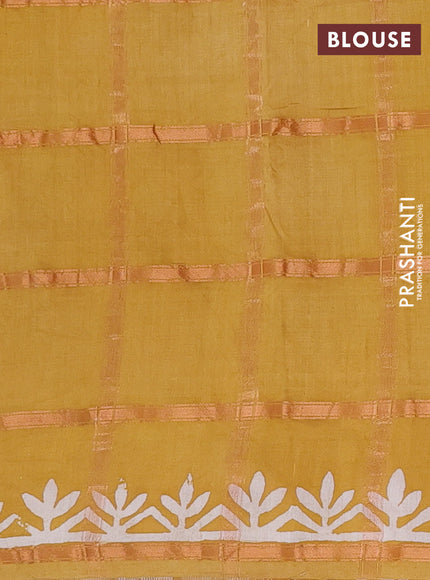 Semi chanderi saree mustard yellow with allover zari checks & batik prints in borderless style