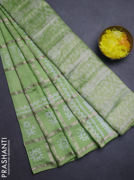 Semi chanderi saree parrot green with allover zari checks & batik prints in borderless style
