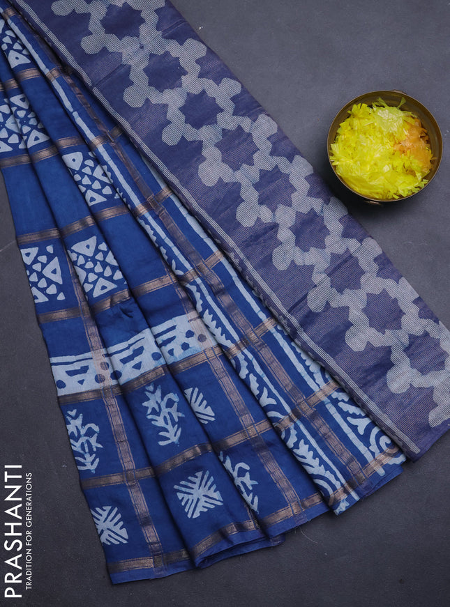 Semi chanderi saree blue and off white with allover zari checks & batik prints and batik printed border