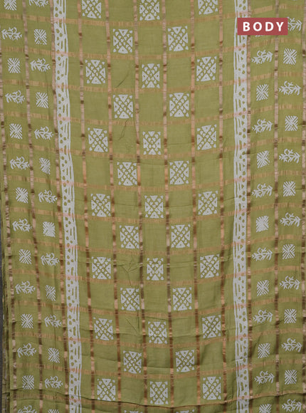 Semi chanderi saree mehendi green and off white with allover zari checks & batik prints and batik printed border