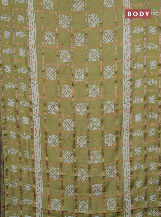 Semi chanderi saree mehendi green and off white with allover zari checks & batik prints and batik printed border