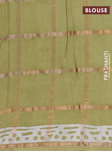 Semi chanderi saree mehendi green and off white with allover zari checks & batik prints and batik printed border