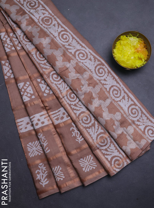 Semi chanderi saree pastel brown and off white with allover zari checks & batik prints and batik printed border