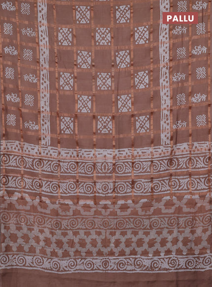 Semi chanderi saree pastel brown and off white with allover zari checks & batik prints and batik printed border